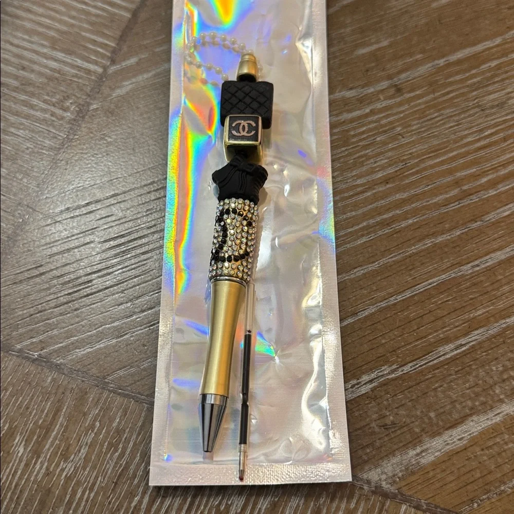 CHANEL Cream Quilted Pouch With Pen, Keychain, Ribbon, & Dust Bag - Picture 9 of 11